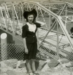 People posing with bridges