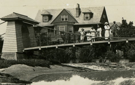 People posing with bridges