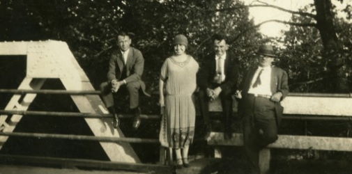 People posing with bridges