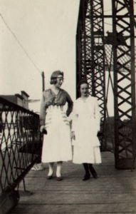 People posing with bridges