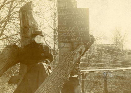 People posing with bridges