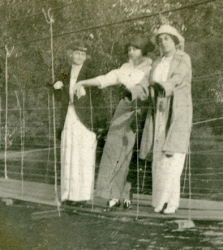 People posing with bridges