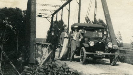 People posing with bridges