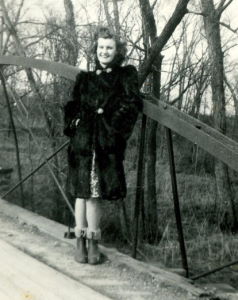 People posing with bridges