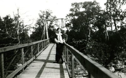 People posing with bridges