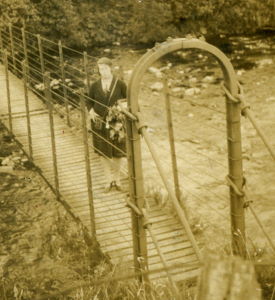 People posing with bridges