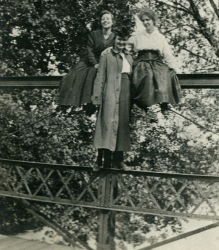 People posing with bridges