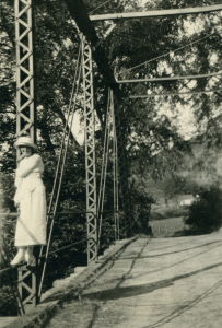 People posing with bridges